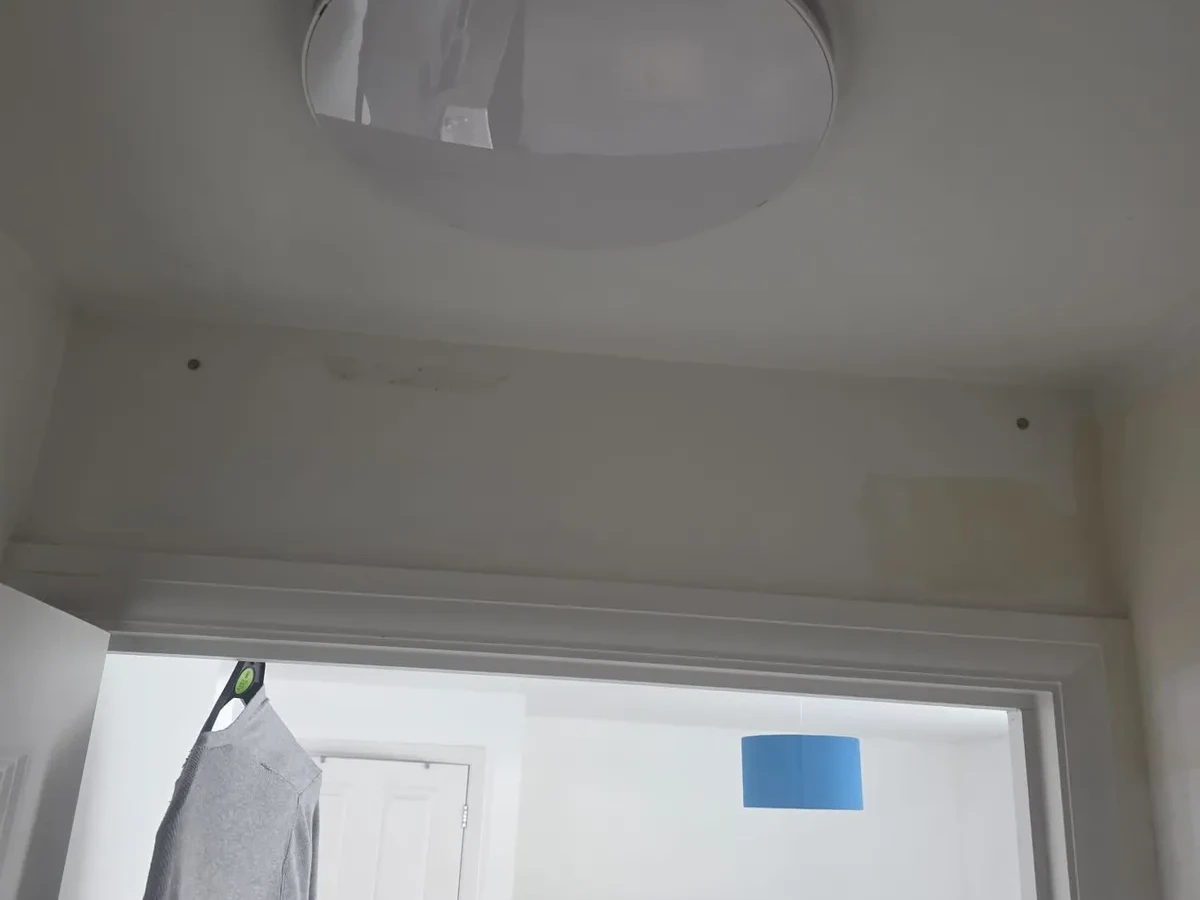 Flush ceiling light replaced on a landing